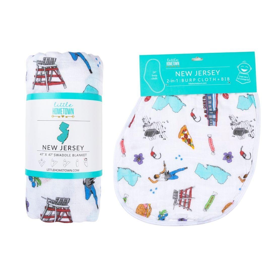 New Jersey-themed baby gift set with muslin swaddle blanket and burp cloth, featuring state icons and landmarks.