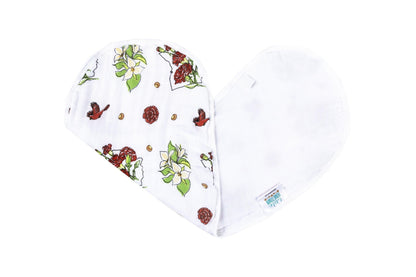 Ohio-themed baby gift set with floral muslin swaddle, receiving blanket, and burp bib, all neatly arranged.