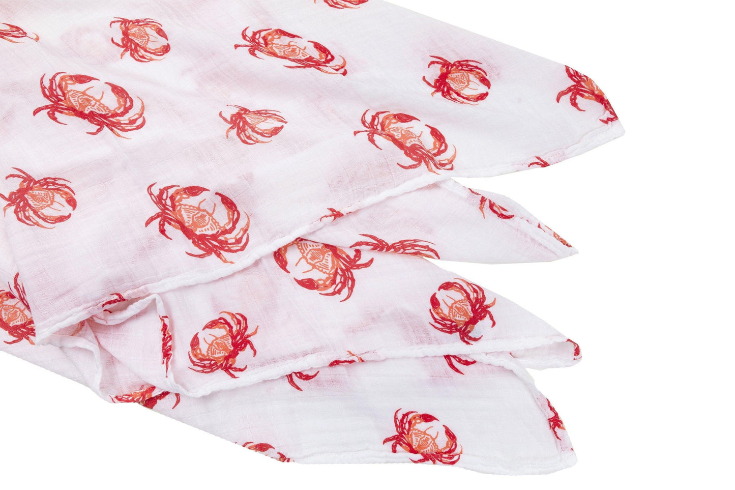 Pink crab-themed baby muslin swaddle blanket and burp cloth set, neatly folded on a white background.
