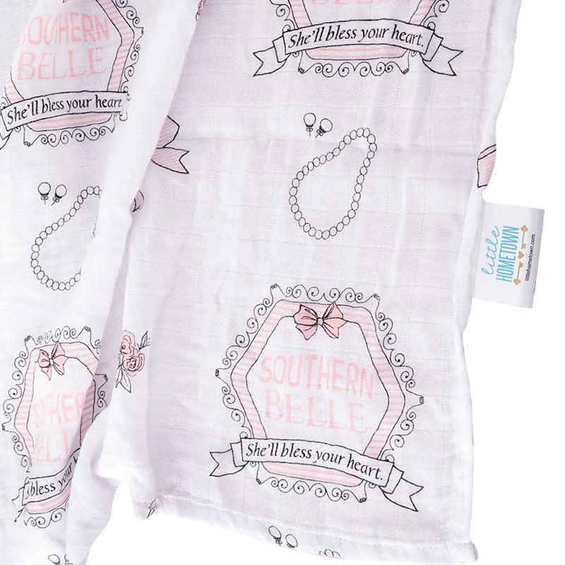 Southern Belle baby gift set with a muslin swaddle blanket and burp cloth/bib combo, featuring floral designs.