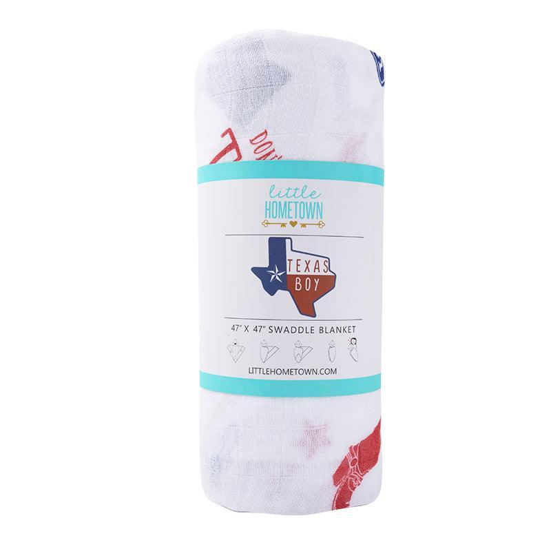 Texas-themed baby gift set with a muslin swaddle blanket and burp cloth/bib combo, featuring blue and white designs.