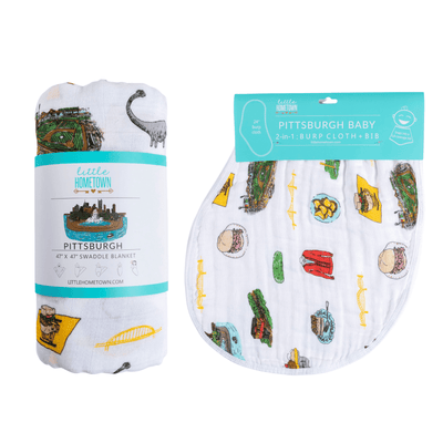 The Pittsburgh gift set, a rolled swaddle and matching burp cloth and bib combo of bridges and pierogies.
