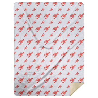 Red and white plush throw blanket featuring playful crawfish and lobster illustrations, measuring 60x80 inches.