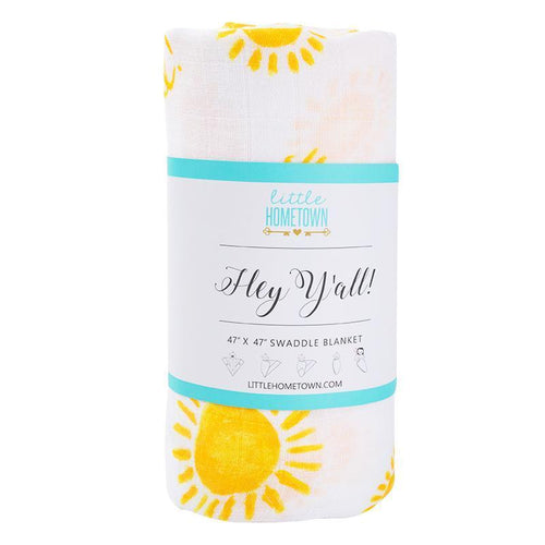 White muslin swaddle blanket with 