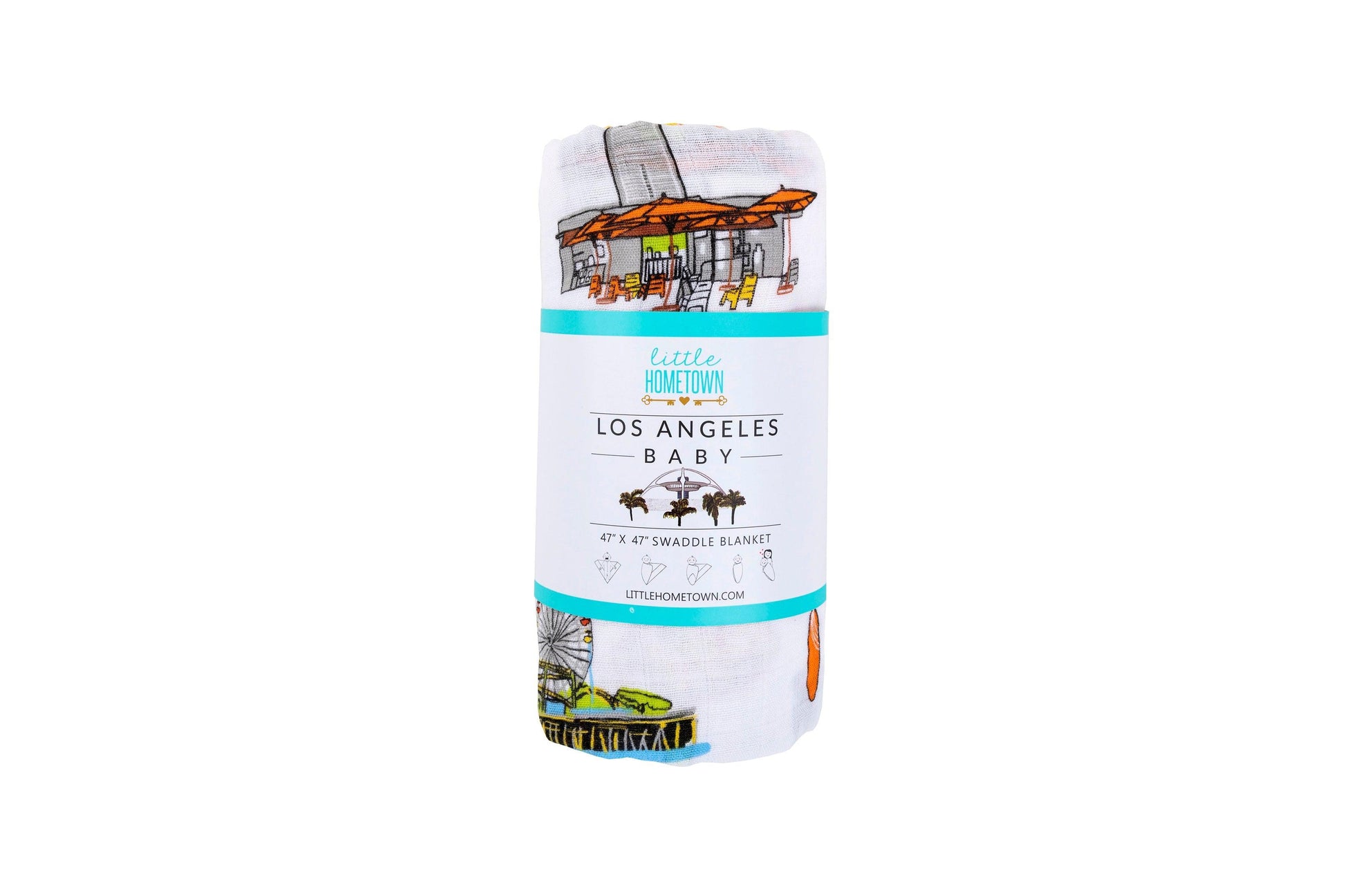 White muslin swaddle blanket with a colorful Los Angeles cityscape design, featuring landmarks and palm trees.