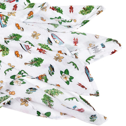 Louisiana-themed baby muslin swaddle blanket with state icons like crawfish, pelican, and magnolia on white fabric.