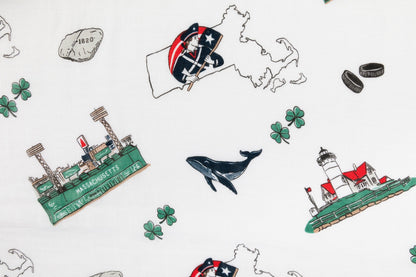 Massachusetts-themed baby muslin swaddle blanket with state icons like lobsters, lighthouses, and sailboats.