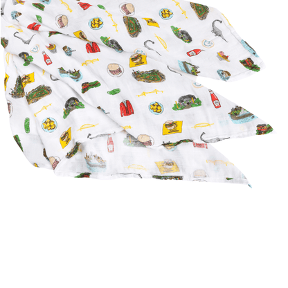 Pittsburgh-themed muslin swaddle blanket featuring iconic city landmarks in a playful, colorful design.