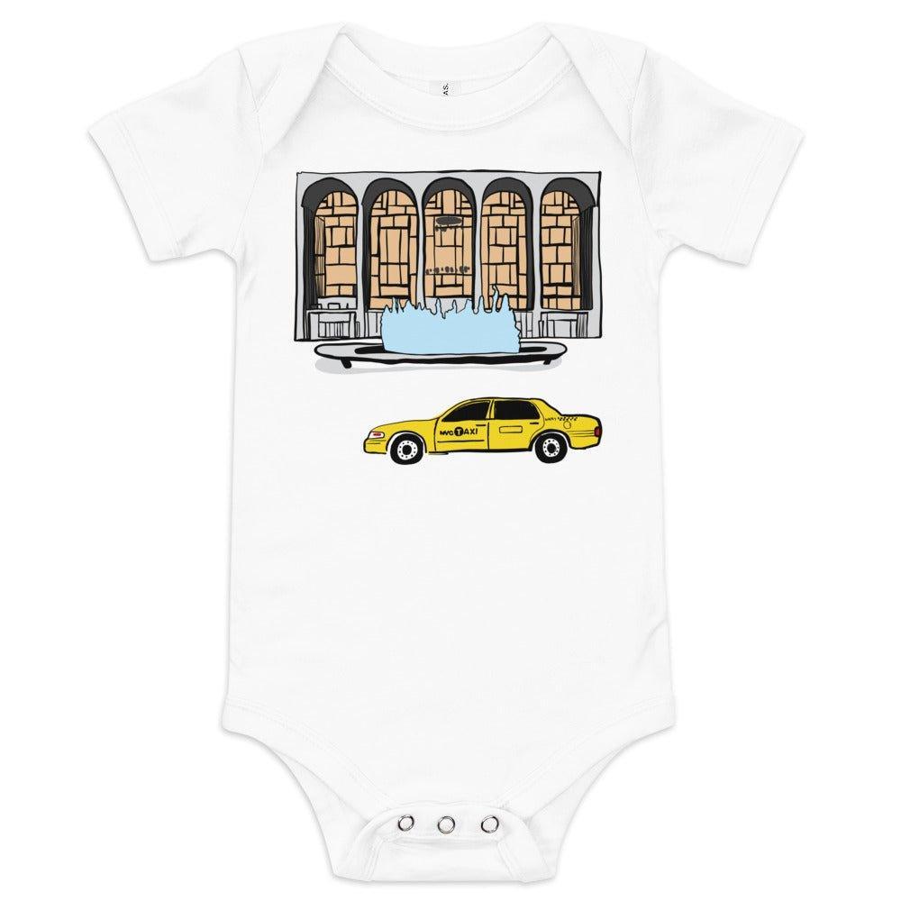 White baby onesie featuring an artists rendering of New York City's Lincoln Center and a taxi cab driving in front of it - on a white background