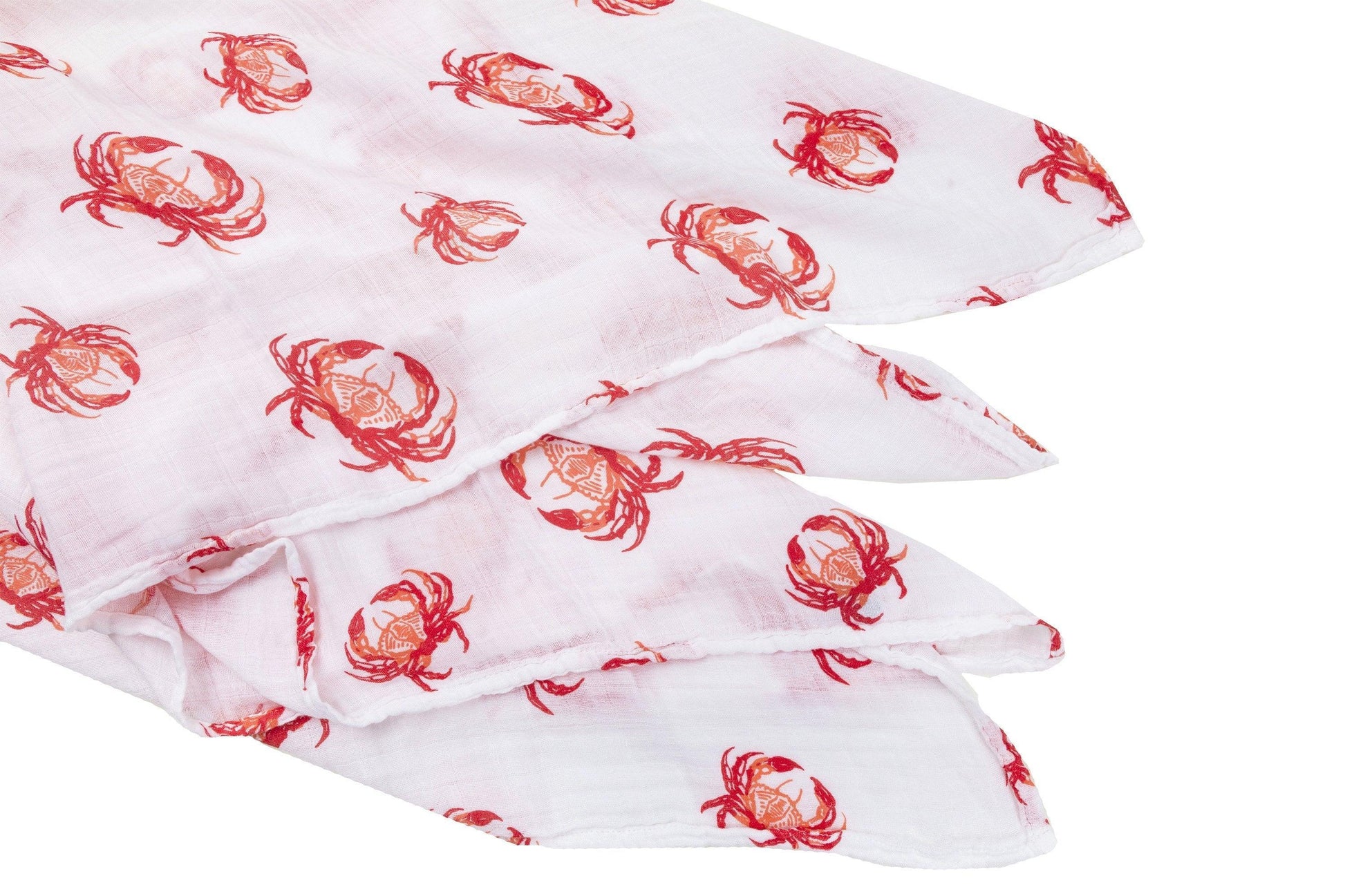 Soft pink muslin swaddle blanket with cute crab illustrations, perfect for newborns and baby showers.