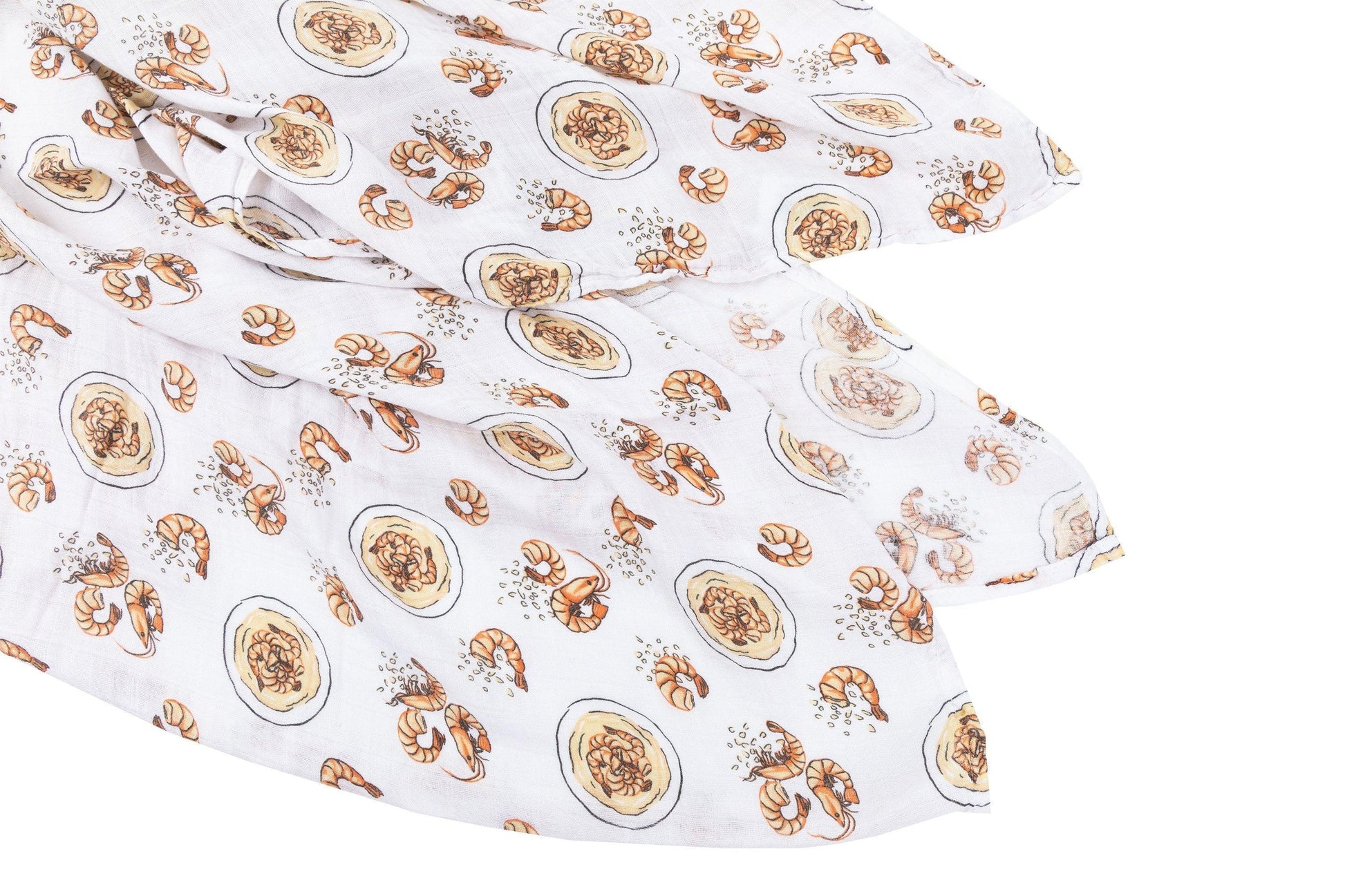 White muslin swaddle blanket with playful shrimp and grits illustrations, featuring vibrant orange and yellow hues.