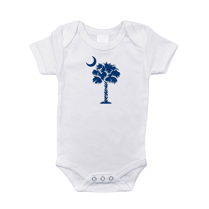 White baby onesie with a blue palmetto tree and crescent moon, text reads "South Carolina" in blue.