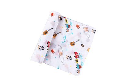 Tennessee-themed baby muslin swaddle blanket with state icons like guitars, boots, and the Tennessee flag.